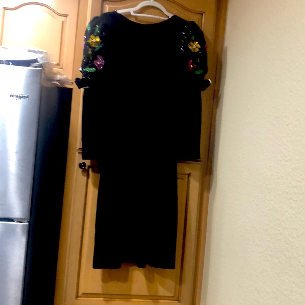 Dress in a beautiful knit (like St John). Size 8